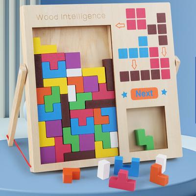 Tetris Baustein-Puzzle für Kinder ist förderlich für die intellektuelle Entwicklung, die Eltern-Kind-Interaktion und Mädchen montieren Spielautomaten-Spielzeug.