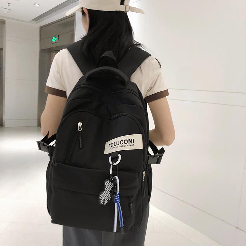 Schoolbag female large capacity simple Japanese ins junior high school student backpack Korean version ins Harajufeng casual backpack