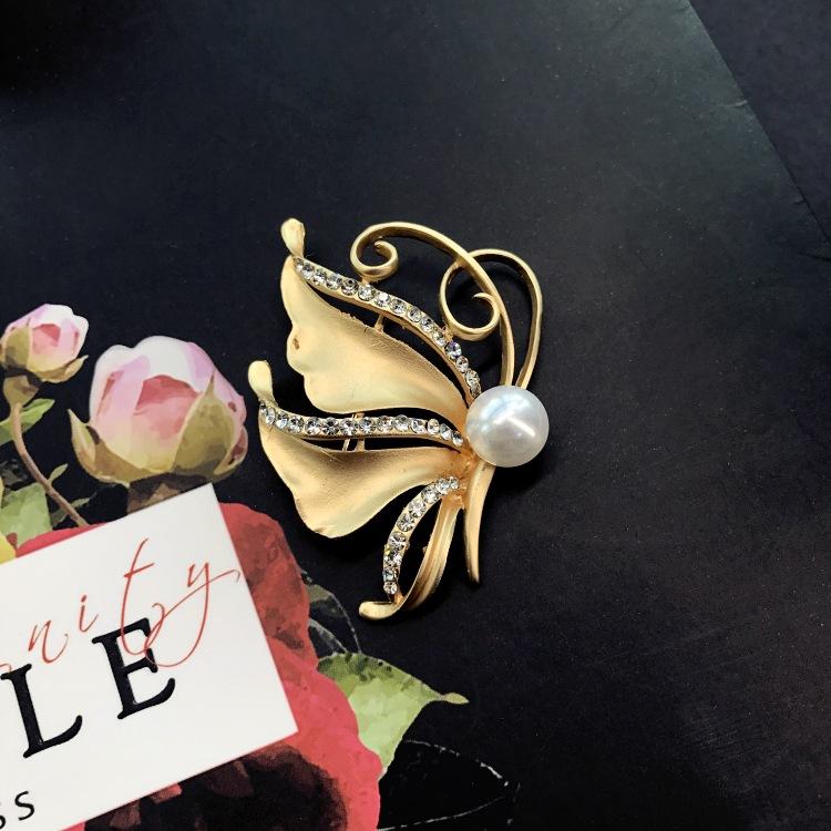 Fashion temperament dumb gold brooch corsage women's suit jacket sweater coat pin crystal high-end accessories