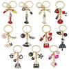 Porta-moedas, clips, porta-chaves – Chaveiros