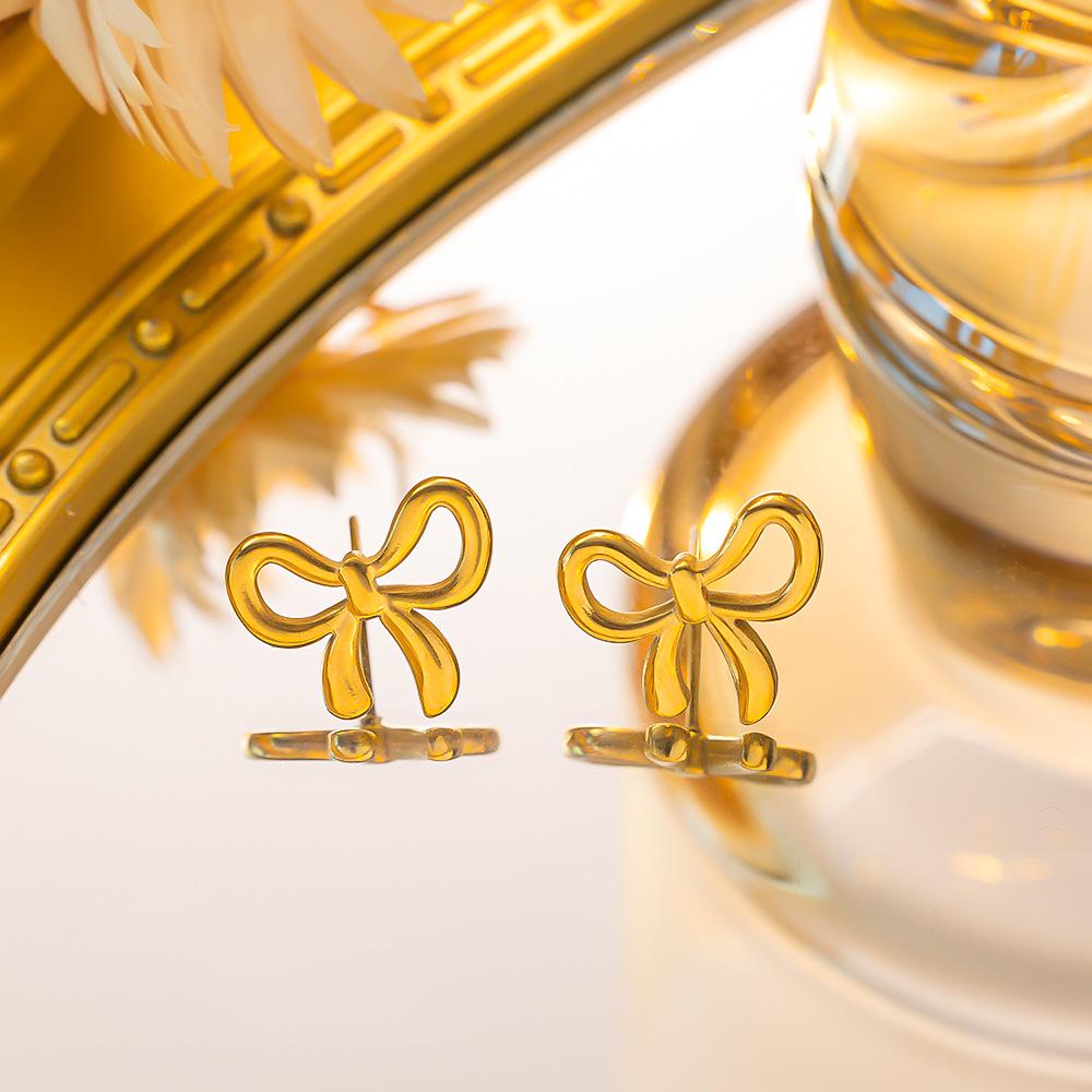 Wen Jian Bow Tie Titanium Steel Stud Earrings: Trendy, Simple, Cool Style for Women 2023