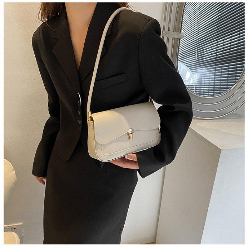 Autumn and winter women's bags fashion niche single shoulder armpit bags irregular lock texture popular women's bags