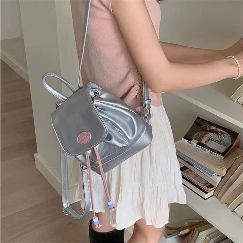 

Сумки женские дорожные серебристые контрастные рюкзаки женские мягкие кожаные сумки Niche Simple Casual через плечо серебряный