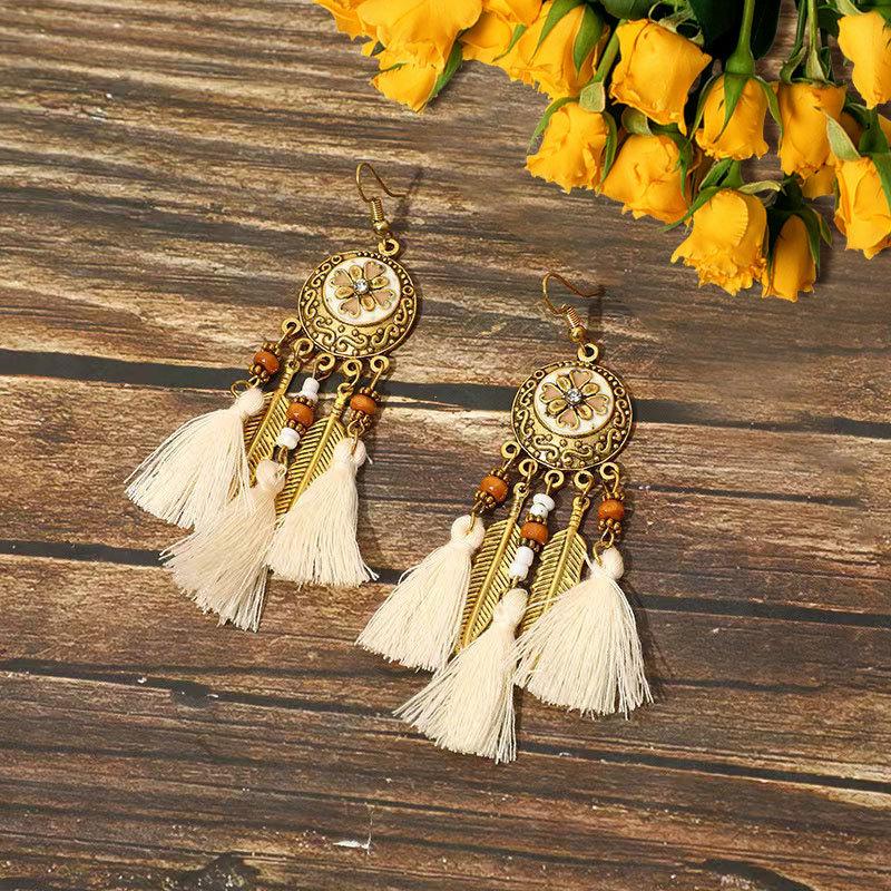 Cross-border ethnic style earrings, high-end diamond-encrusted earrings, bohemian long fringed earrings, travel photography jewelry.