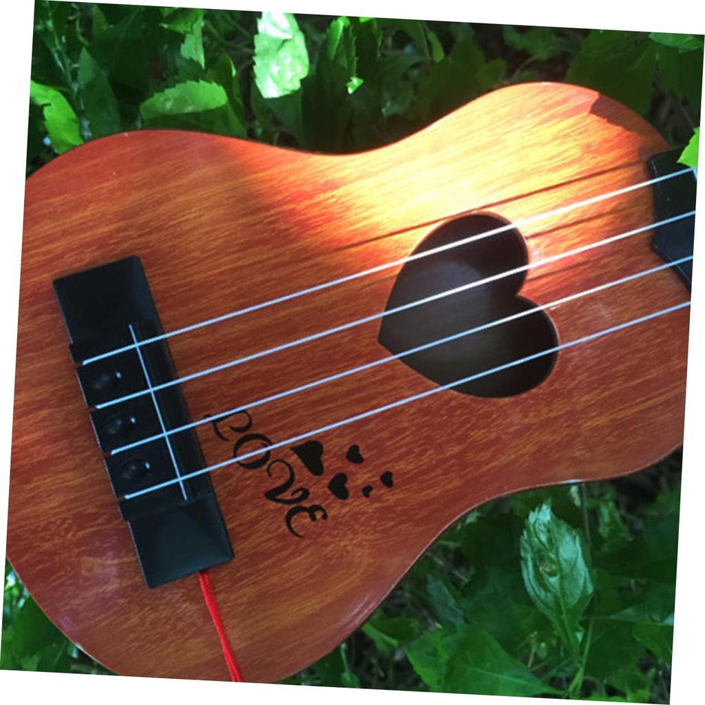 SEWACC Ukulele Plastic Mini Ukulele Mini Guitar for Children Acoustic Guitar 4 String Guitar Beginner Guitar Children Musical Instrument Playable Easy