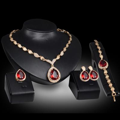 Außenhandelstrend übertriebener Tropfen Edelstein Halskette Ohrringe Armband Ring Legierung Vier-teiliges Set Brautbankett Schmuck
