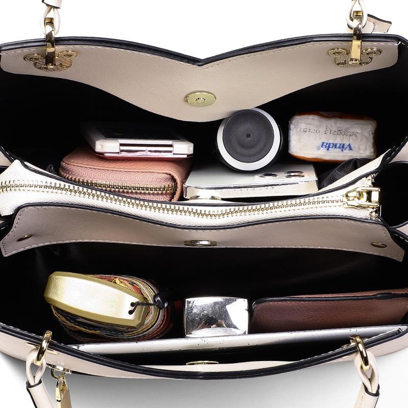 Handbag autumn and winter new portable shoulder bag niche fashion high sense shoulder bag women's bag luggage