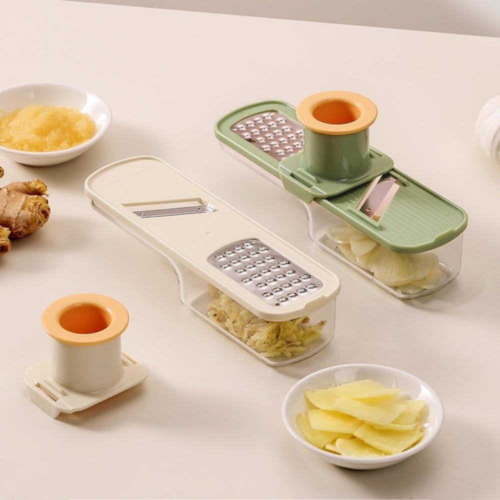 Three-in-one durable plastic manual household garlic mashing machine, grinder, shredder, multi-functional ginger and garlic tool