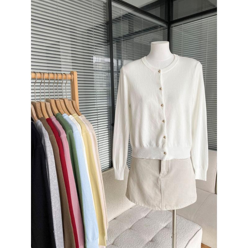 Korean simple round neck singlebreasted candycolored knitted cardigan women's new early autumn gentle wind longsleeved jacket