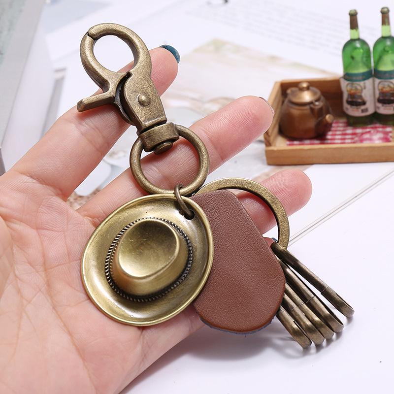 Retro Cowboyhut Punk Schlüsselanhänger Rindsleder Anhänger Legierung Schlüsselring Eisen Schlüsselkette Herren Accessoires Kreatives Autoanhänger Mann Geschenk