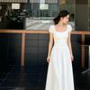 Sexy waist and thin long dress, new summer white pleated bubble sleeve backless dress is popular.