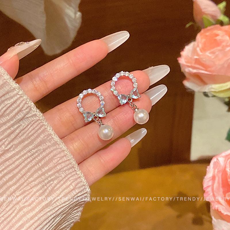 Small zircon bow earrings women s design temperament pearl earrings Korean ears