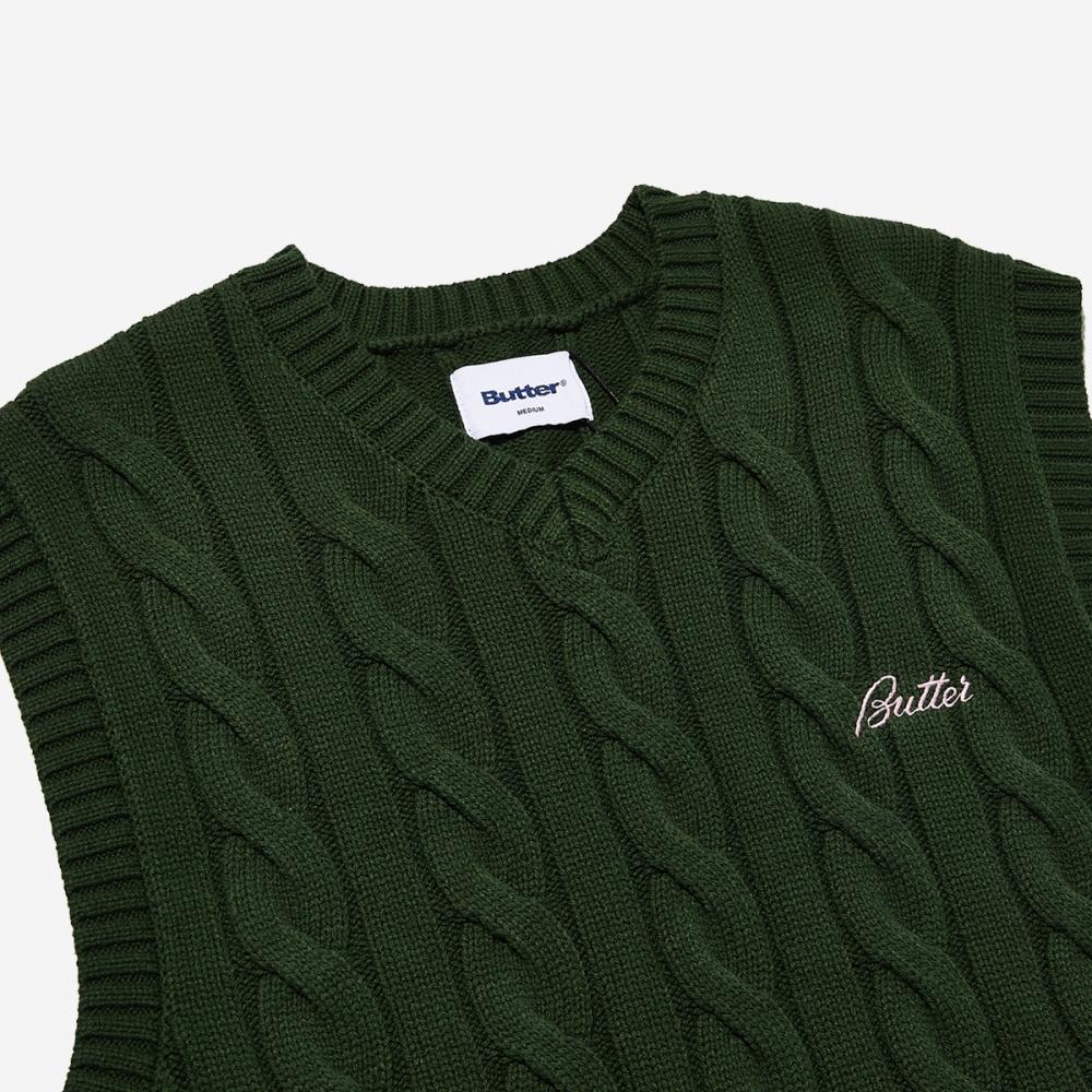 Máslo zboží Kabelová pletená vesta Kabelová pletená vesta