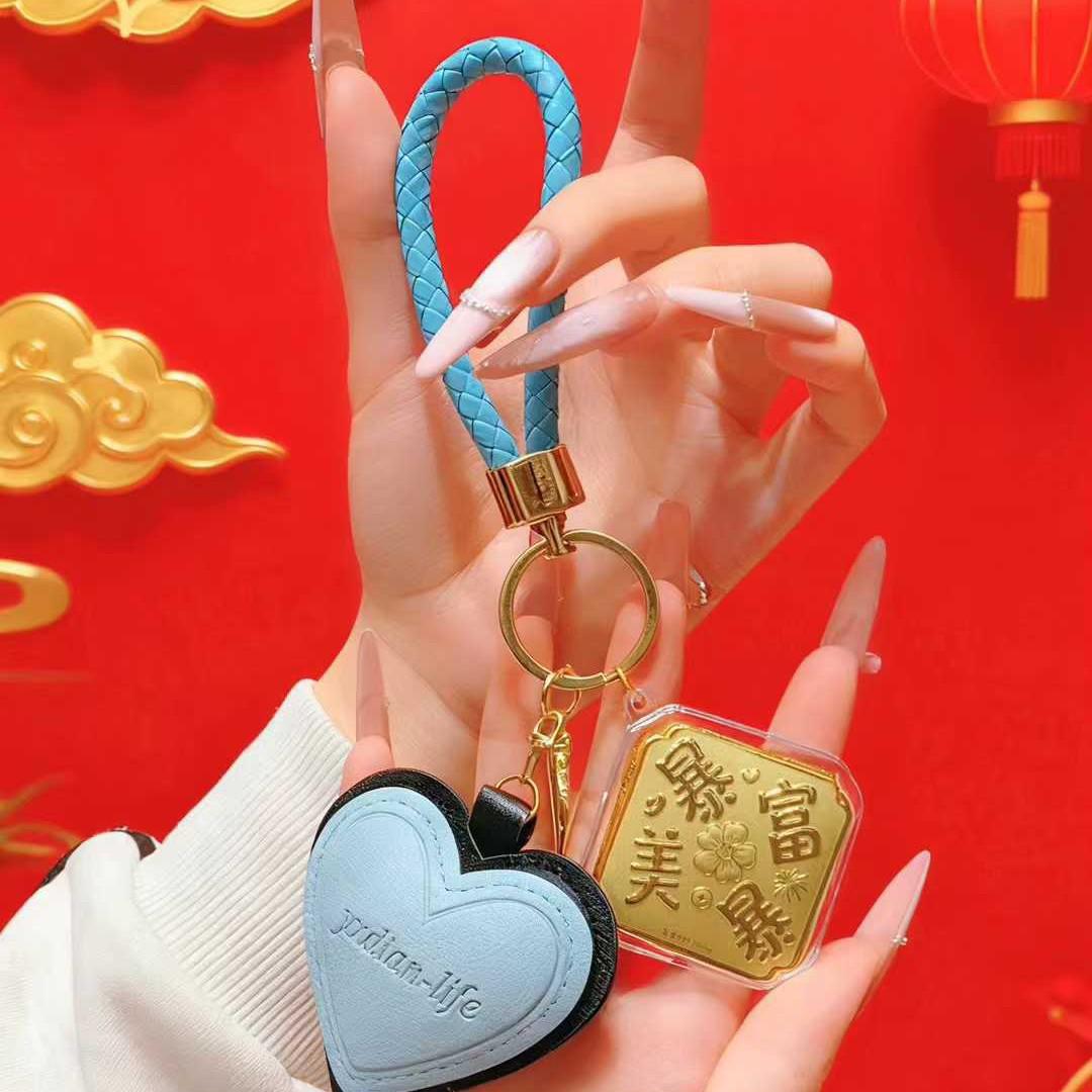 Creative 999 Pure Gold Eight Directions Leather Heart Keychain: A Unique Business Gift for Customers