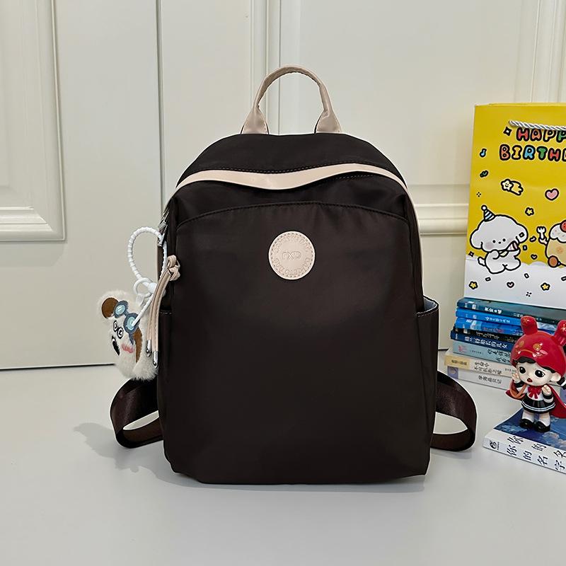 Niche design backpack women's new commuter versatile travel backpack student casual mini schoolbag