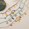 Collar de Perlas de Dopamina en Forma de Corazón con Colgante de Estrella de Mar Multicolor en Acero Inoxidable.