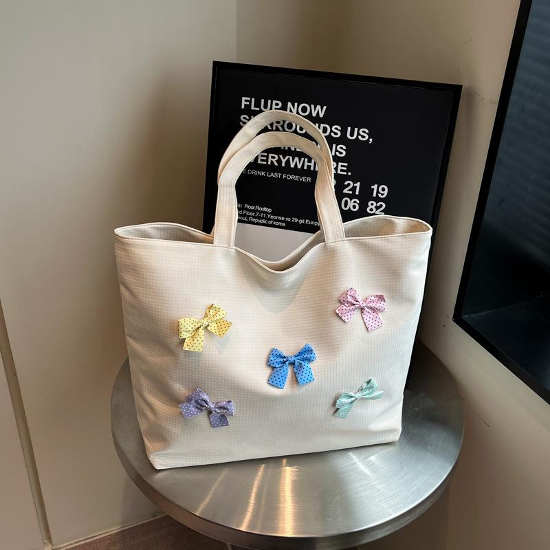 

Fashion trend niche design large-capacity bag 2025 spring new casual texture women s shoulder tote bag білий