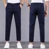Summer ice silk nine-point trousers men's air-conditioning pants trendy slim-fitting small foot suit casual summer pants thin