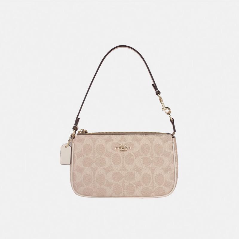 

Сумка через плече COACH Nolita 19 з фірмового полотна