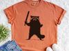 Vintage Raccoon Sword Shirt – Raccoon Silhouette Tee, Funny Raccoon with Sword, Weird Animal Lover Gift, Retro Goth Racoon Graphic Tee