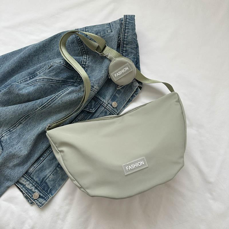 Fashionable And Minimalistic Dumpling Bag For Women Spacious Shoulder Bag Available In Black White Green Red Orange And Pink