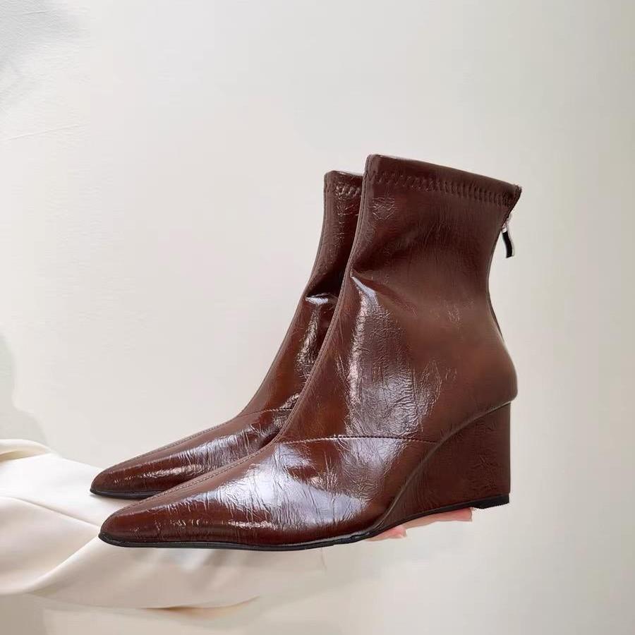 Inner heightening Martin boots women's 2025 new autumn and winter temperament thin pointed wedge heel high heel short boots rear zipper boots