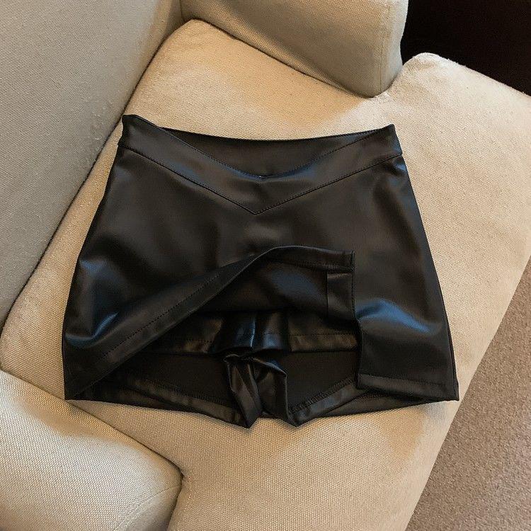 

Осенне-зимняя шерстяная юбка А-силуэта с завышенной талией, облегающая бедра и с разрезом. XL