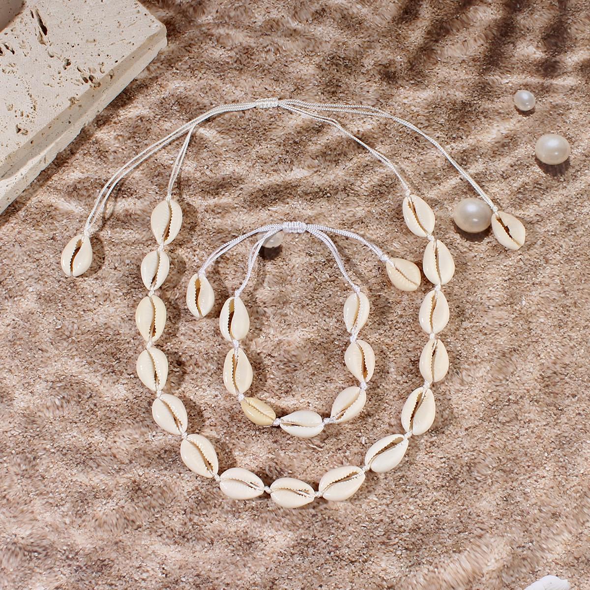 

Ручная работа Европейская и Американская Мода Ракушка Ожерелье, Браслет, Браслет на ногу с Плетеным Чокером из Пресноводной Раковины и Цепочкой для Ключицы