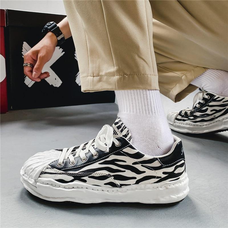 designer flat sneakers