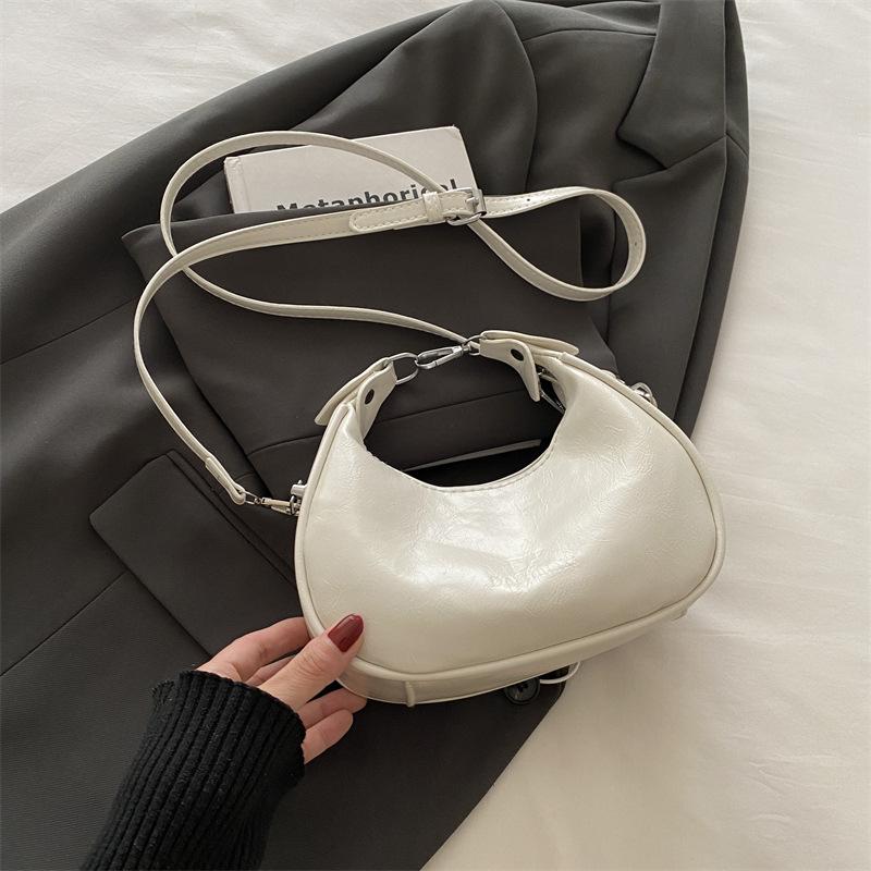 

2025 новая модная сумка-мессенджер с текстурой полумесяца, нишевая дизайнерская сумочка, повседневная простая темпераментная сумка через плечо