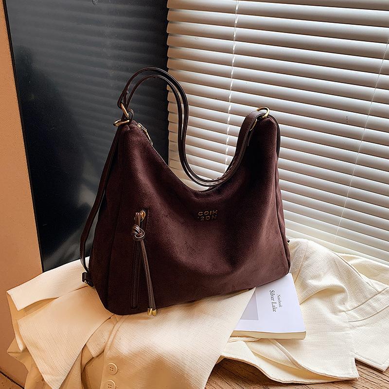 Lässige Pendler-Tragetasche Damen große Kapazität 2025 neue Schulter-Umhängetasche Retro-Mode leichter Rucksack