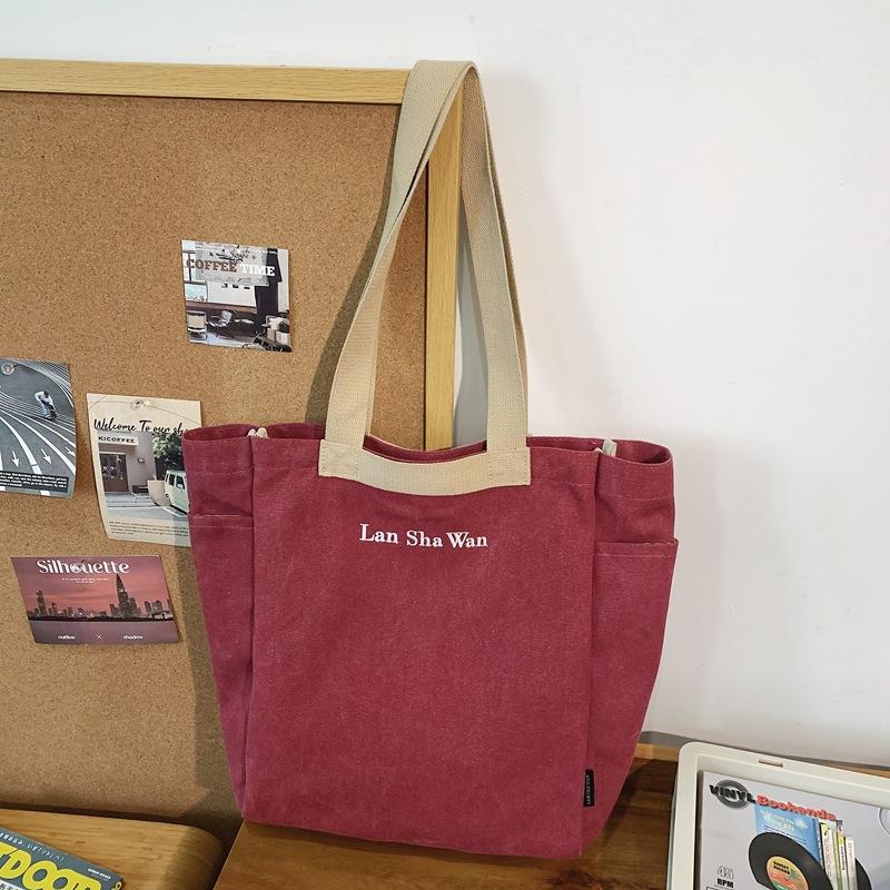 

Popular new canvas bag women commute to work large-capacity shoulder bag simple tote bag class portable canvas bag червоний