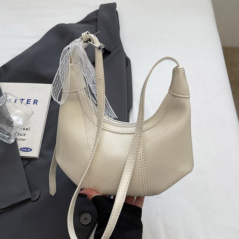 Popular Wholesale Fashion Simple Oil Wax Skin Niche Solid Color Dumpling Bag Temperament Commuting To Work Versatile Messenger Women's Bag