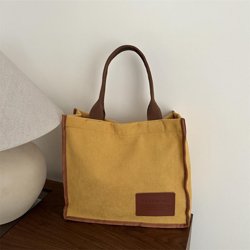 2025 summer new literary and artistic large-capacity class shoulder portable messenger bag casual simple canvas women's bag