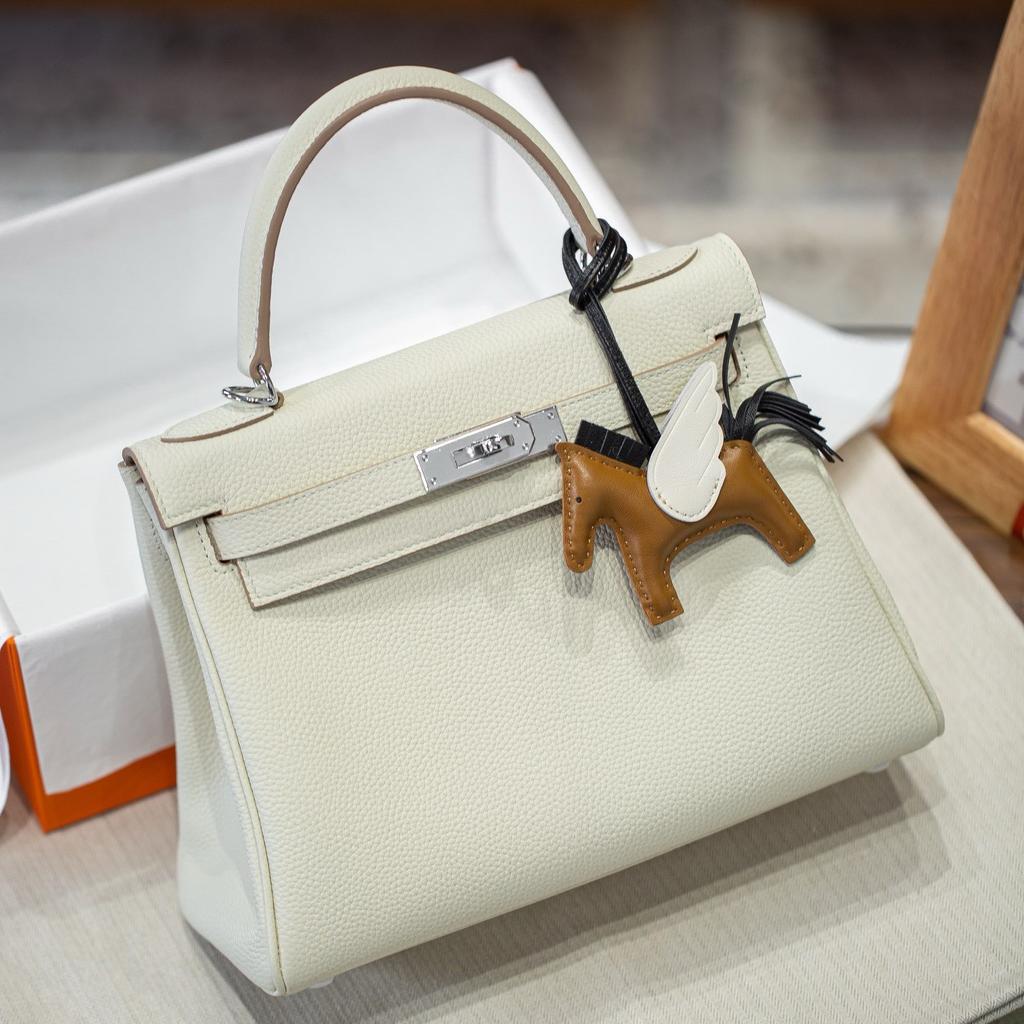 25 Neue Kelli Tasche Togo Rindsleder erste Schicht breiter Schultergurt silberne Schnalle große Kapazität tragbar Schulter Umhänge Tasche Pendler Damen Tasche