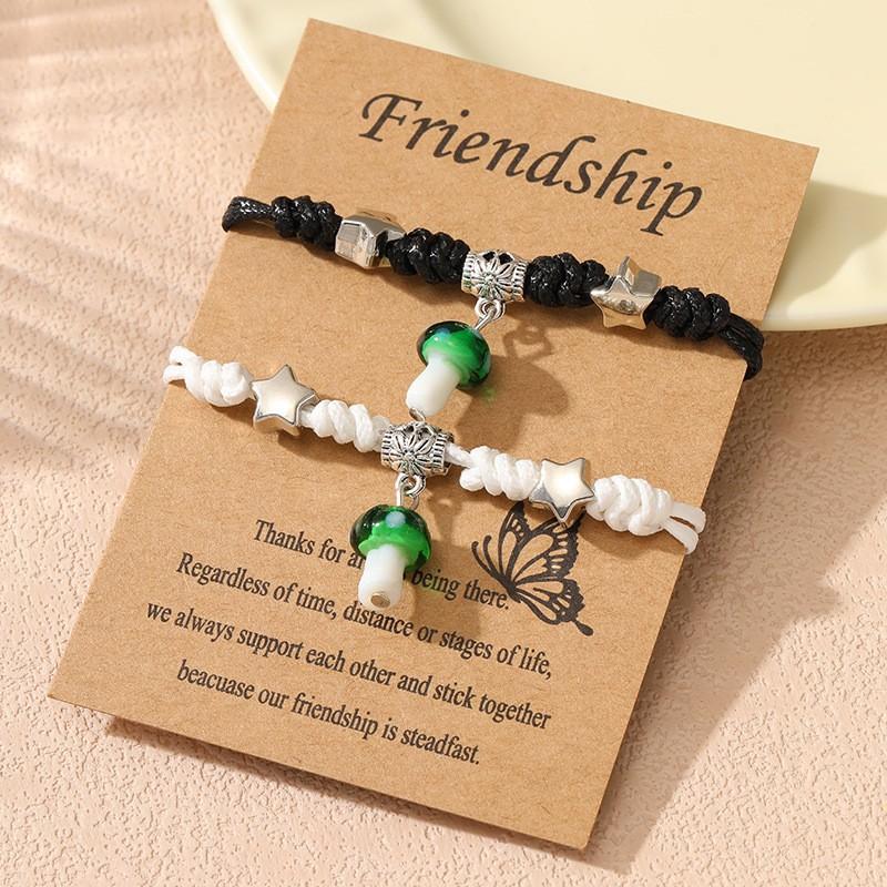 A pair of woven small mushroom couple bracelets, male and female student girlfriends, purely handmade jewelry.
