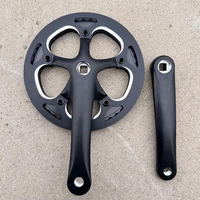 Vélo de route pliable compact avec pédalier monobloc à 46 dents et protège-plateaux double