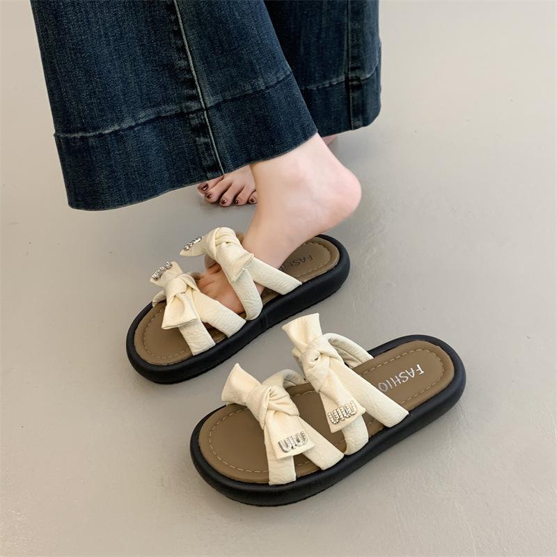 Thick bottom outer wear bow feeling seaside beach Internet celebrity cool slippers women step on shit feeling fashion fairy new