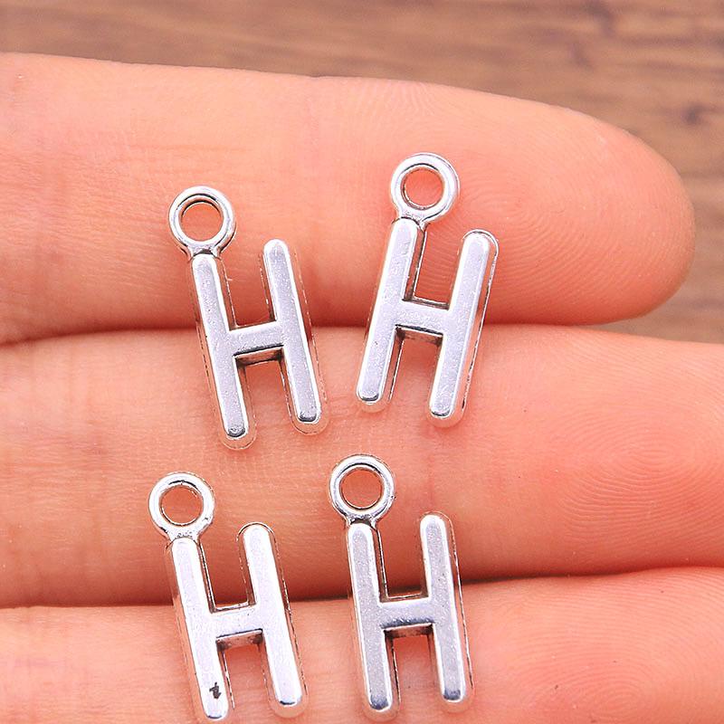 Zinc Alloy Alphabet Charms: 2 Colors, 26 Letter Pendants for Jewelry, Handbag, and Mobile Phone Accessories