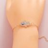 Ladies Titanium Steel Hand Shape Devil's Blue Pupil Crystal Bracelet Jewelry
