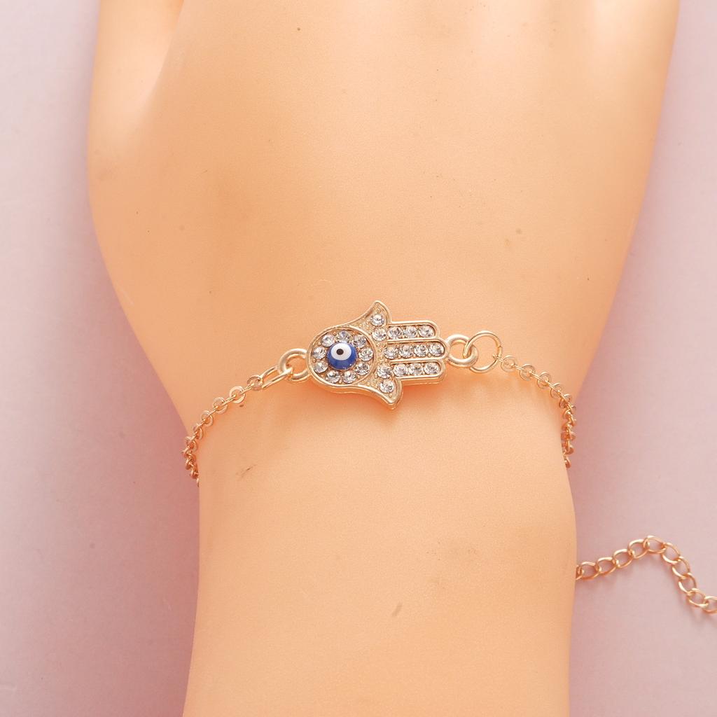 Ladies Titanium Steel Hand Shape Devil's Blue Pupil Crystal Bracelet Jewelry