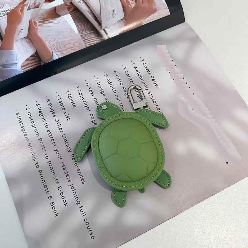 2025 New Leather Pendant Head Layer Leather Mini Earphone Bag Turtle Pendant Wallet Cross Border