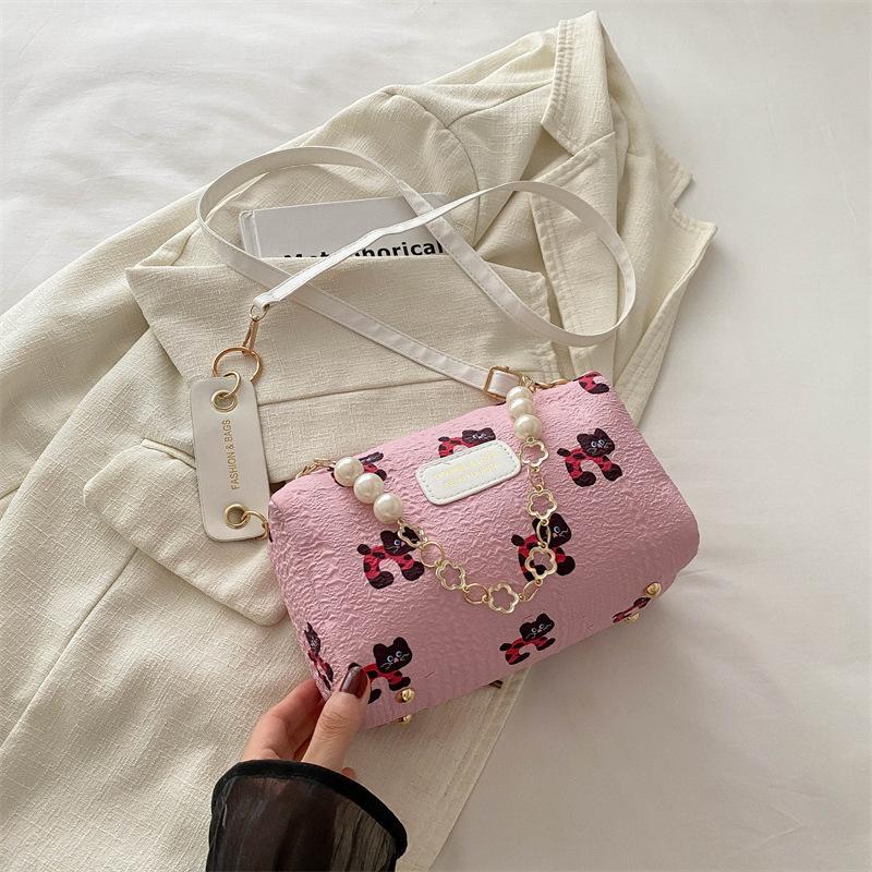 Exquisite high-end textured small bag 2025 summer new small fresh powder grid pillow bag versatile messenger shoulder bag