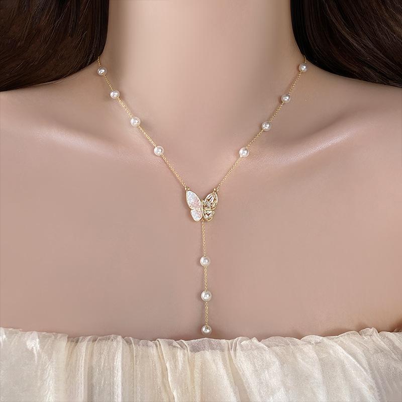 Schmetterlingsquaste Perlenanhänger Halskette: Elegante High-End Schlüsselbeinkette für Damen