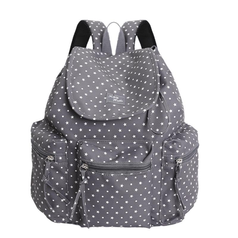 Schoolbag Korean sweet polka dot backpack bag women's 1011 new girls versatile high-value schoolbag drawstring casual backpack