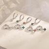 French Emerald Four-Leaf Clover Rhinestone Earrings: Colorful Zirconia Flower Studs & Trendy Lucky Clover Ear Cuffs.