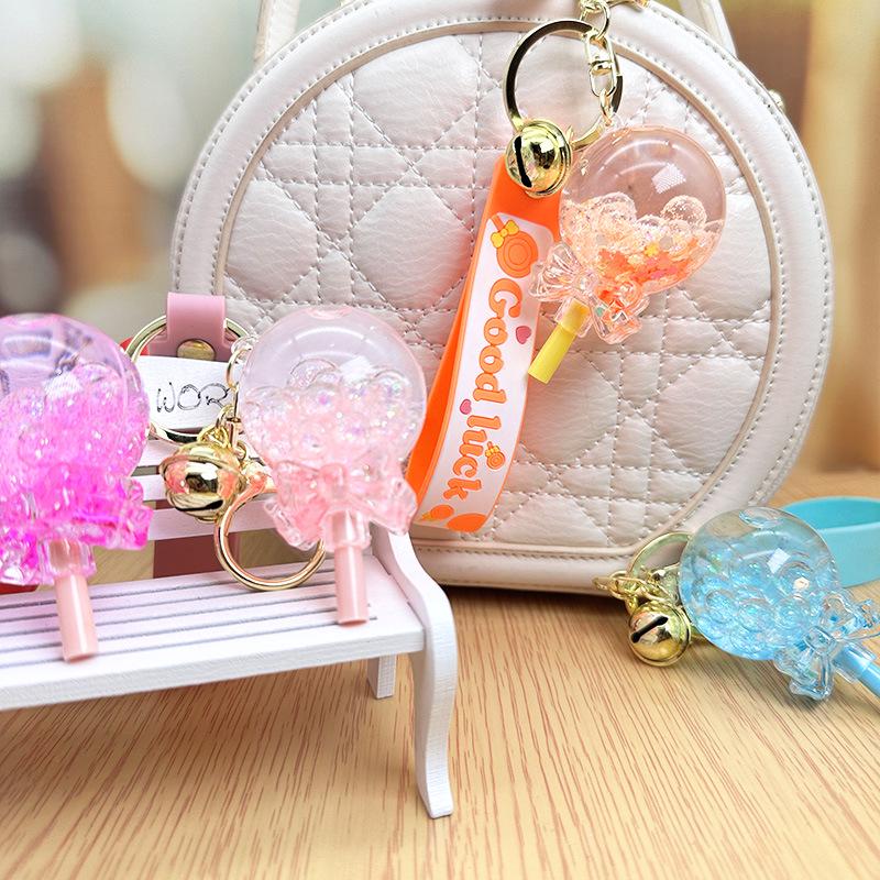 Nádherná klíčenka s lízátkem s plovoucím pískem: Roztomilý přívěsek na dívčí školní tašky