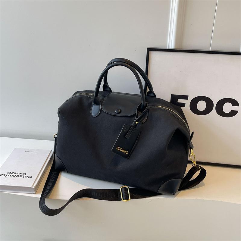 Travel bag Women's large capacity fashion lightweight short-haul luggage bag Portable outdoor portable fitness bag Birth storage bag