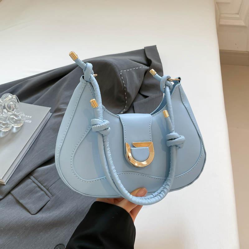 

Fashion women s bags, niche design, temperament, underarm baguette bag, simple and versatile, high-end single shoulder crossbody saddle bag синий