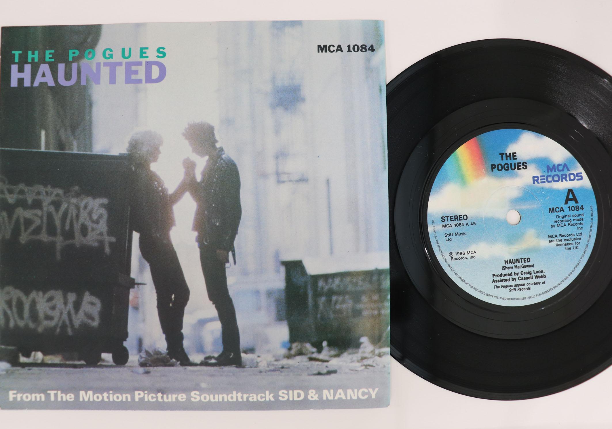 

7inch Record POGUES - Haunted / Junk Theme MCA1084 MCA 1986 UK Rock Used
